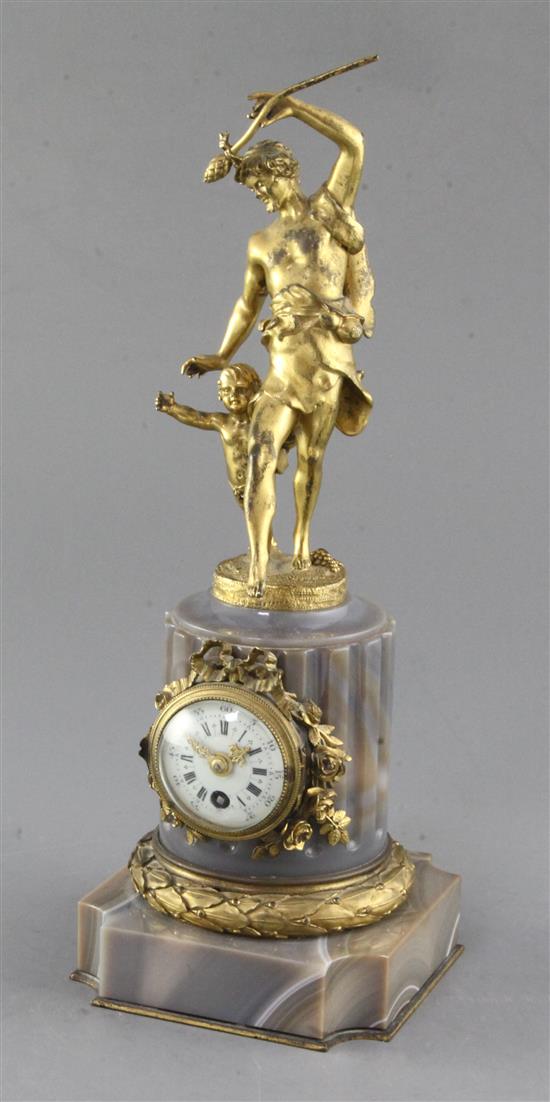 An early 20th century ormolu mounted banded agate mantel timepiece,